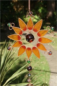 Carillon &#233;olien avec grand tournesol orange