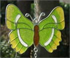 Carillon &#233;olien avec papillon vert