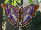 Carillon &#233;olien avec papillon violet