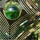 Fileur du vent, diamant ondul&#233; avec bille de verre verte